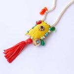 Necklace with pearls, fabric and beads