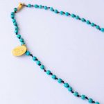 Necklace with turquoise and gold-plated eye