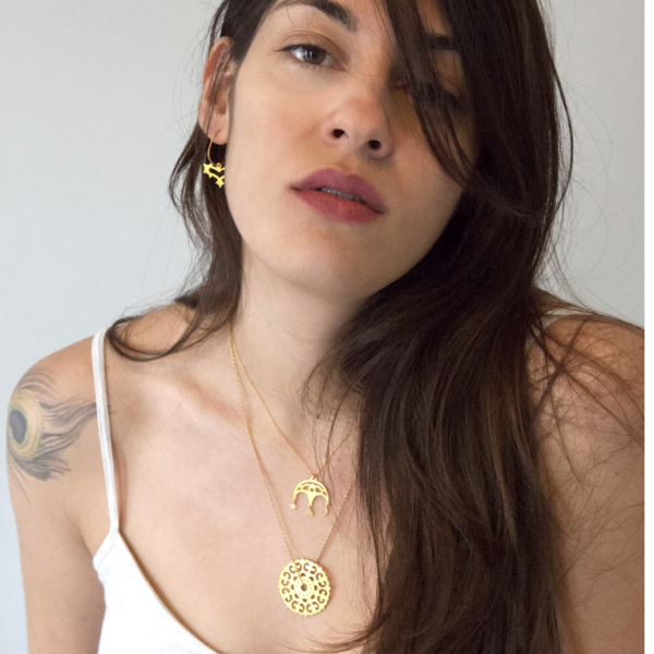 Gold plated silver pendant on chain necklace with star, moon and heart detail